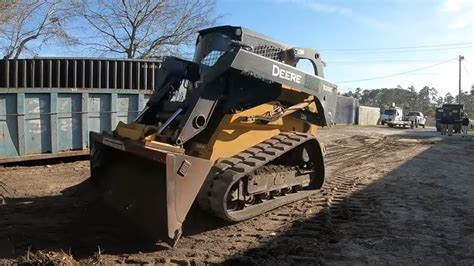 digging a swale with a skid steer|Grading A Drainage Swale With A Skid Steer .